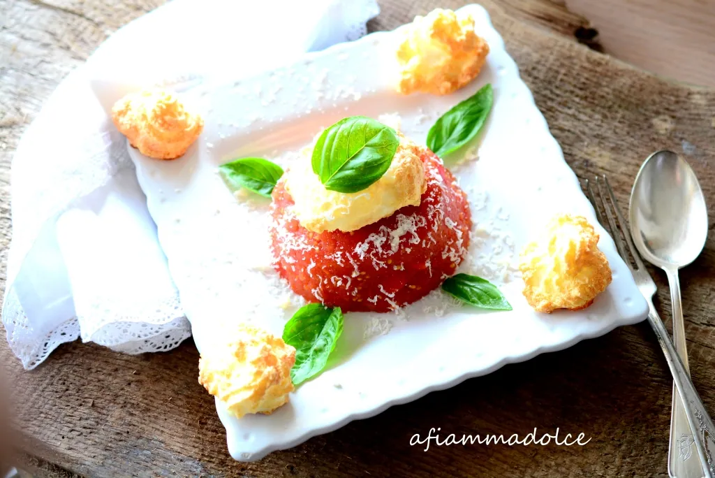 Aspic di pomodorini con meringhe salate al parmigiano Reggiano